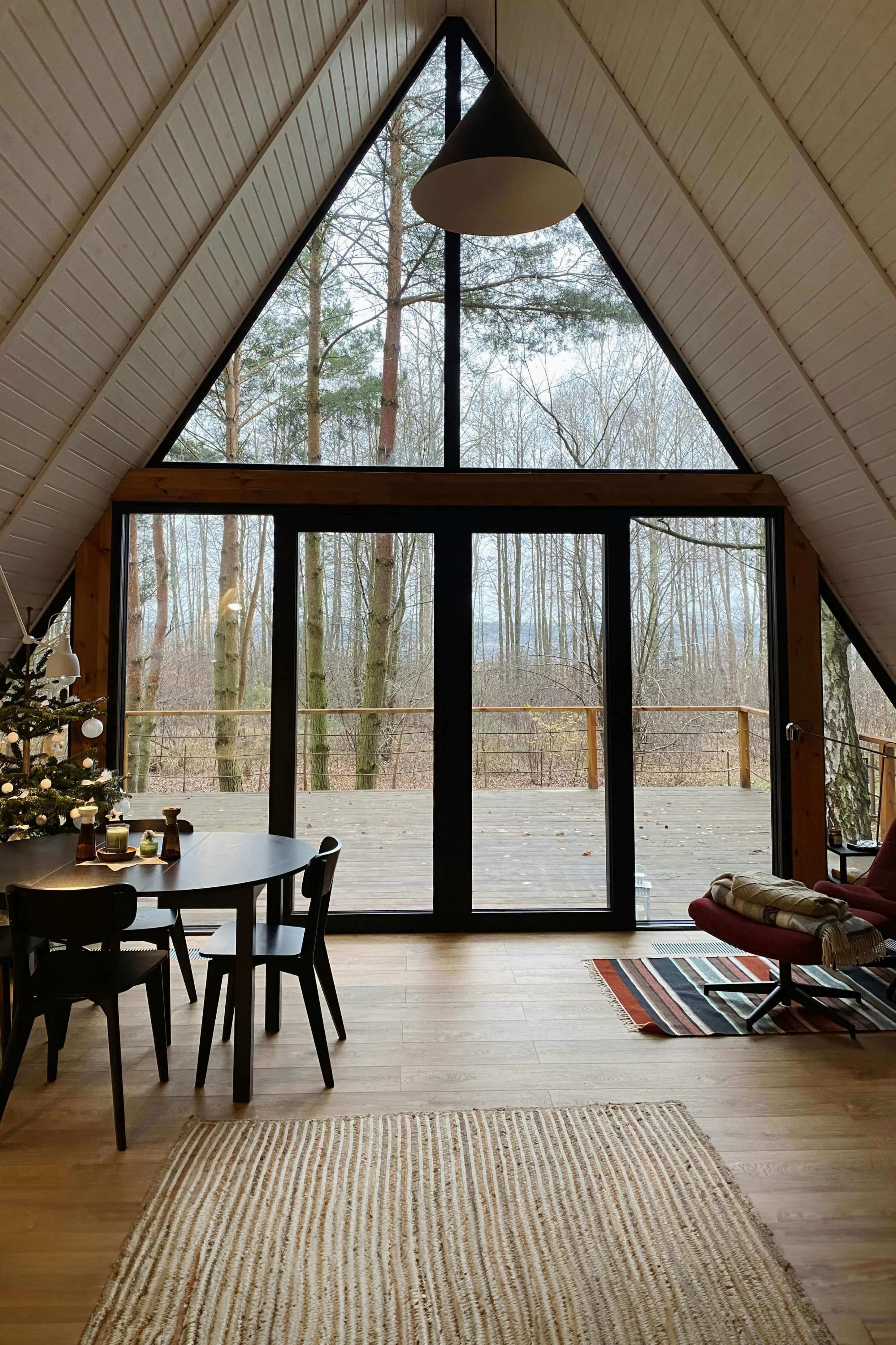 A-frame living room with panoramic window
